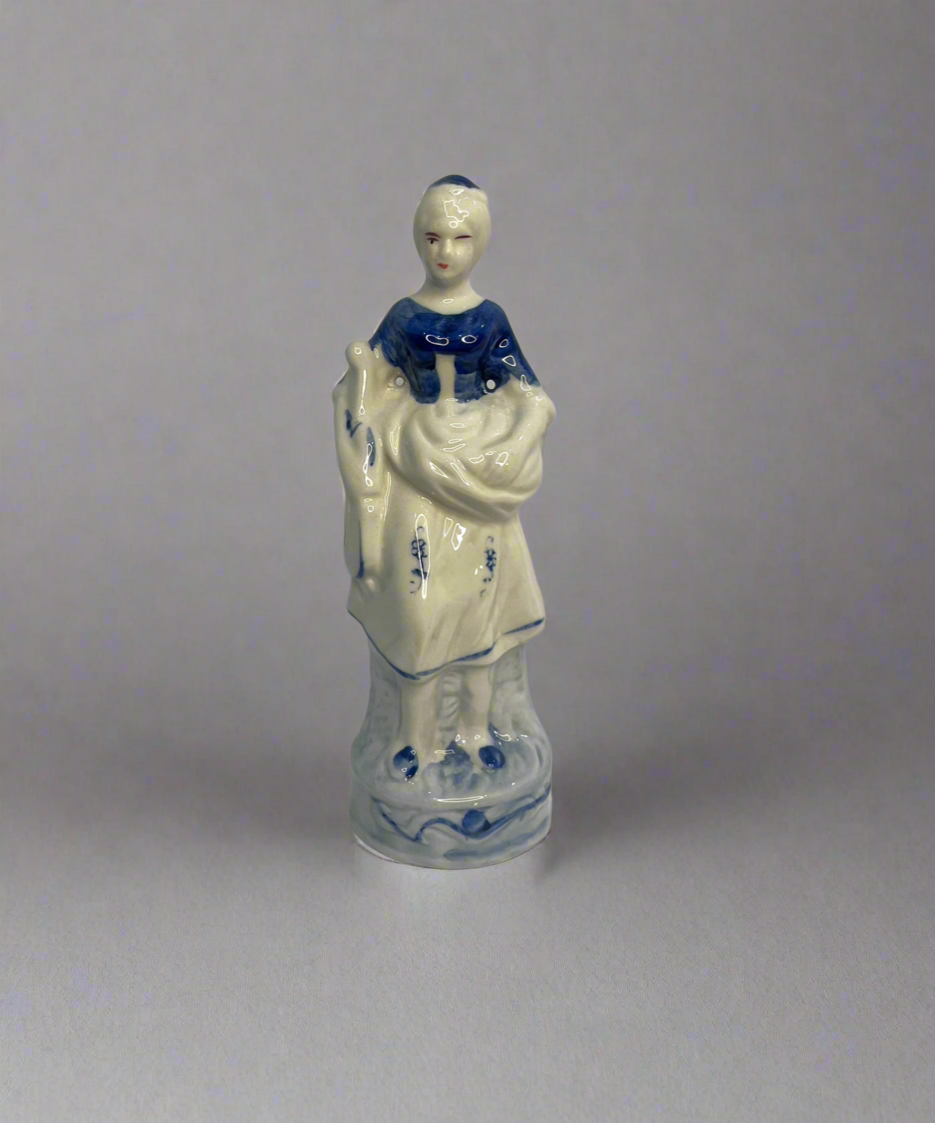 A Chinoiserie Blue And White Ceramic Chintz Figurine Peasant Woman