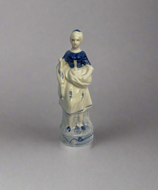 A Chinoiserie Blue And White Ceramic Chintz Figurine Peasant Woman