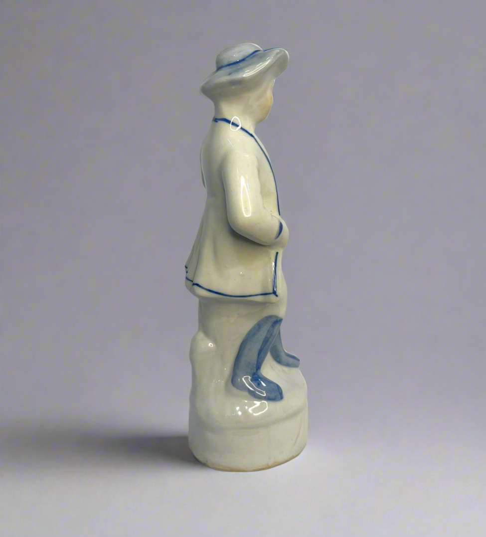 Porcelain Cobalt Blue And White Colonial Man With A Mandolin