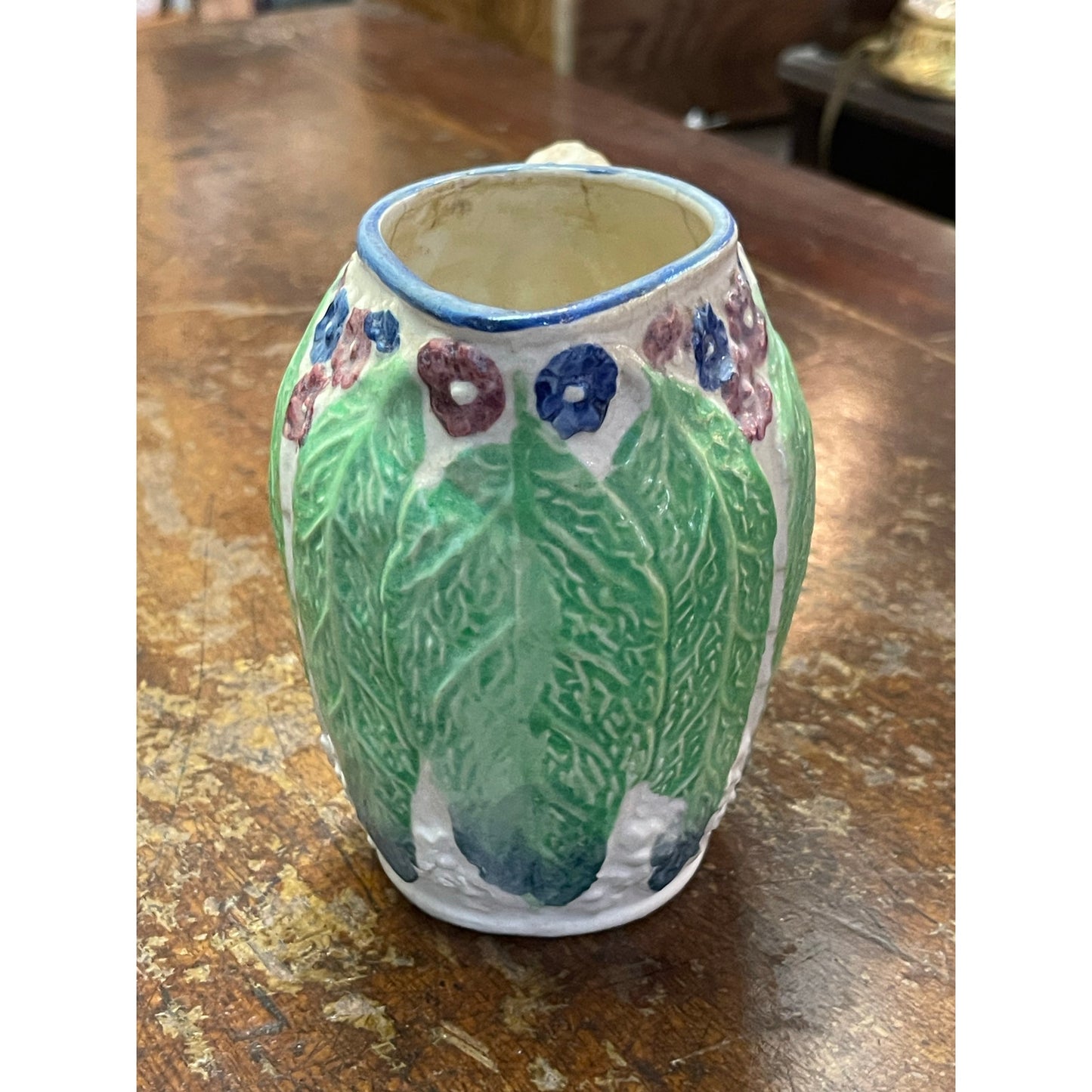 Vintage Majolica Japan hand-painted floral and leaf handled small pitcher
