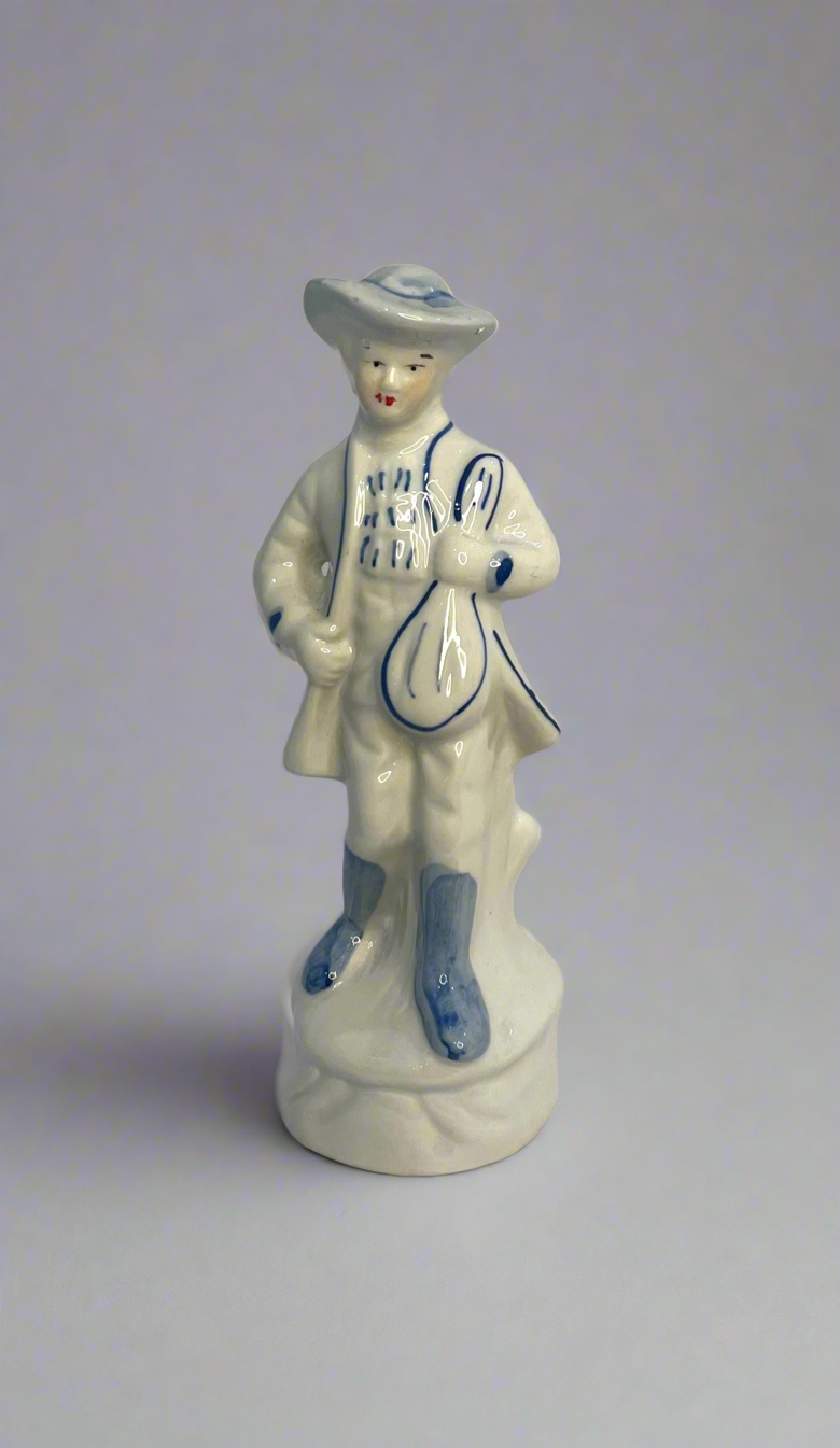 Porcelain Cobalt Blue And White Colonial Man With A Mandolin