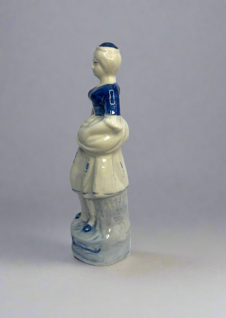 A Chinoiserie Blue And White Ceramic Chintz Figurine Peasant Woman