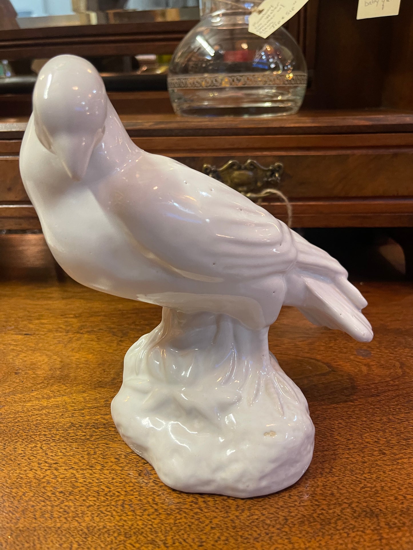 Large white glazed ceramic bird statue
