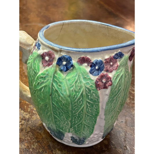 Vintage Majolica Japan hand-painted floral and leaf handled small pitcher