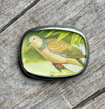 Belt buckle, bird