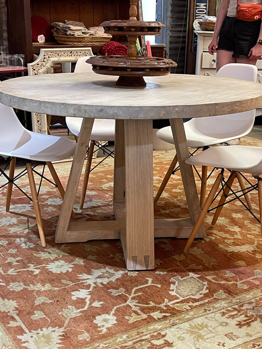 Round light color dining table