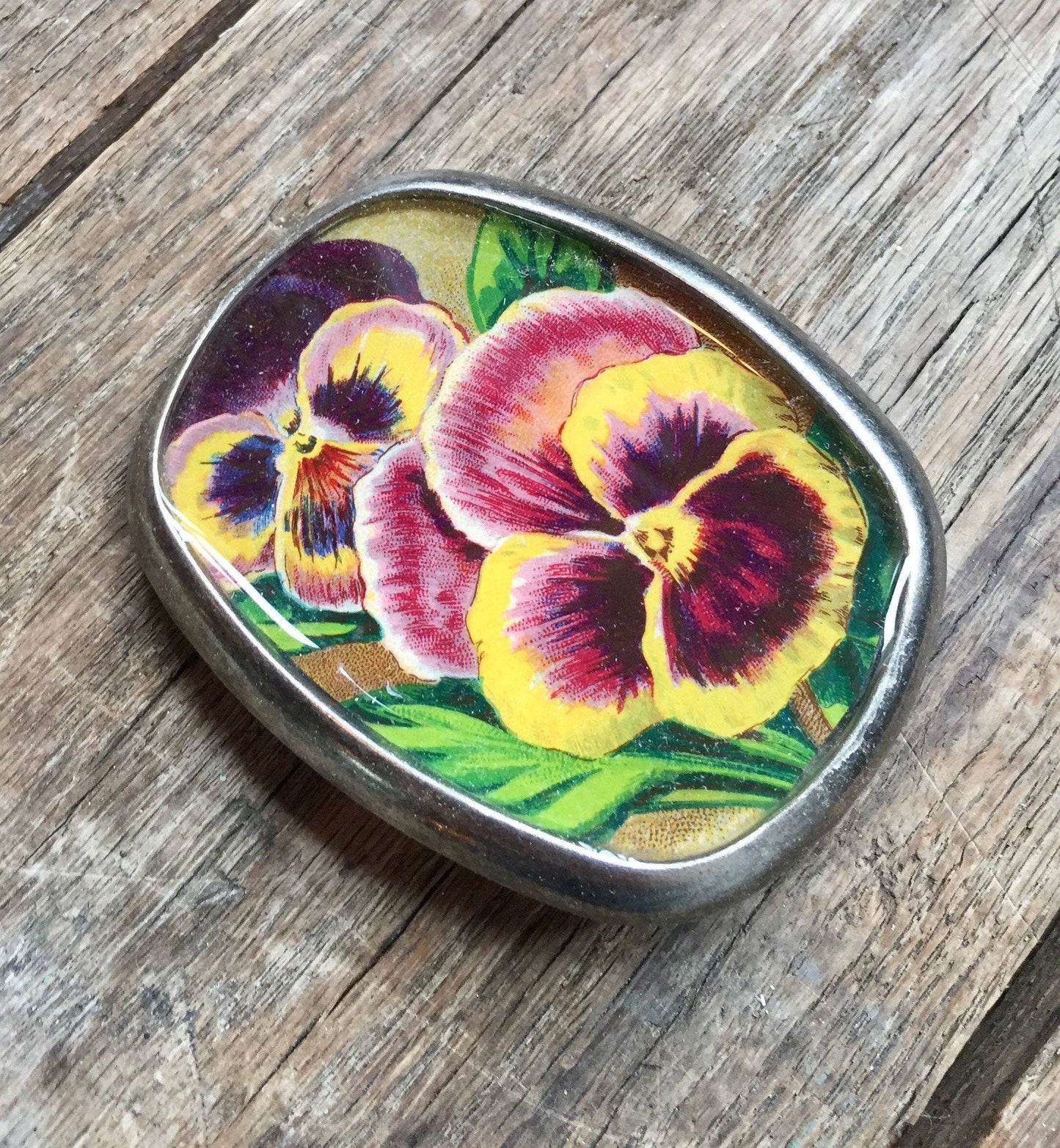 Belt buckle, botanical