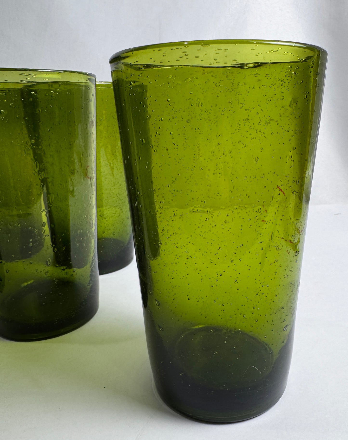 (6) hand-blown avocado green seeded glasses. CSBH